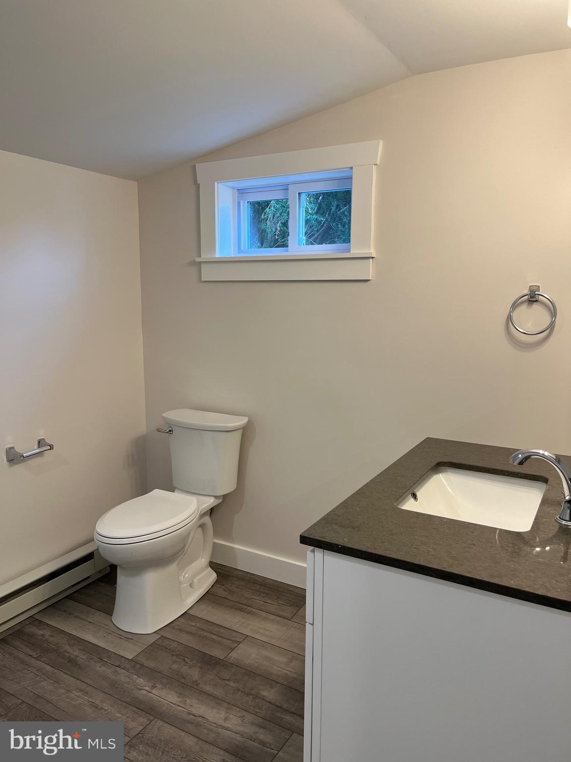 917 A A N Old Road, Unit 2 Strasburg, PA 17579 - Photo 4 of 7 a bathroom with a toilet and a sink