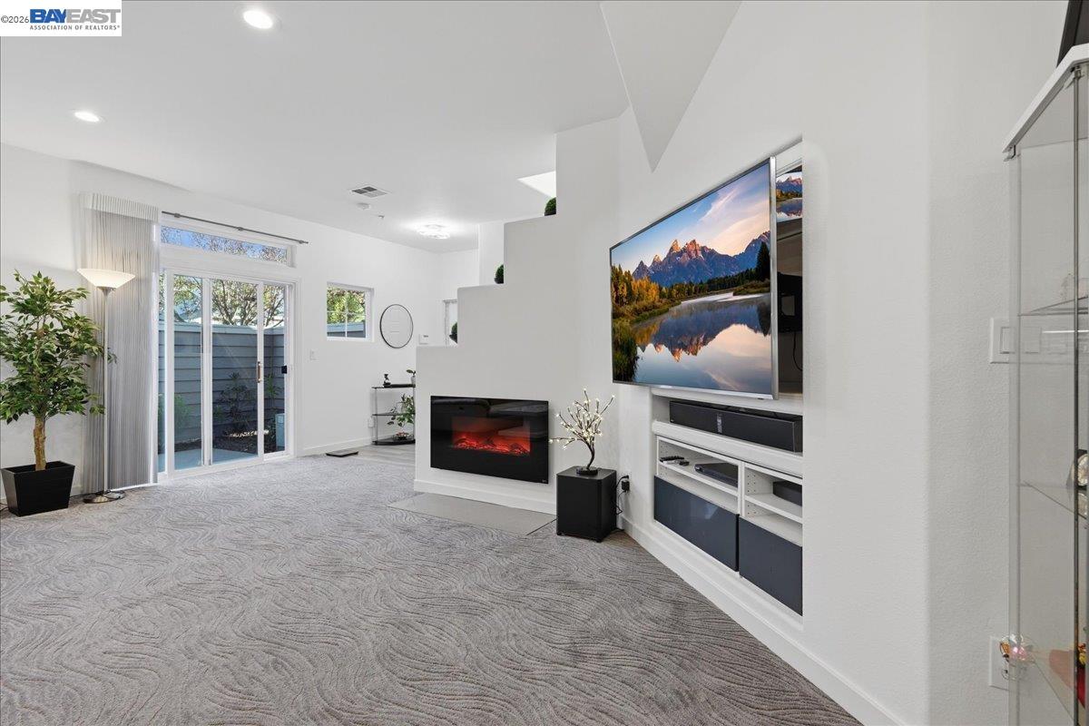 130 Sutter Creek Lane San Ramon, CA 94583 - Photo 14 of 56 a view of a living room with flat screen tv