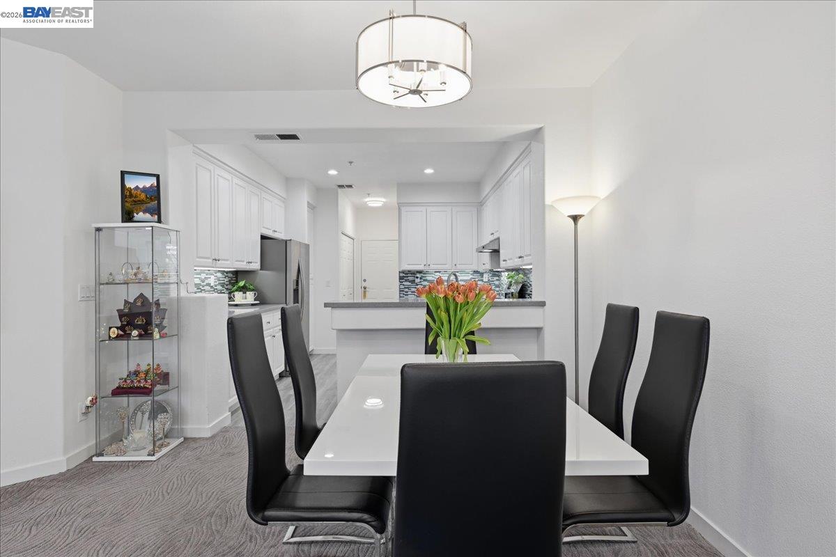 130 Sutter Creek Lane San Ramon, CA 94583 - Photo 23 of 56 a view of a dining room with furniture