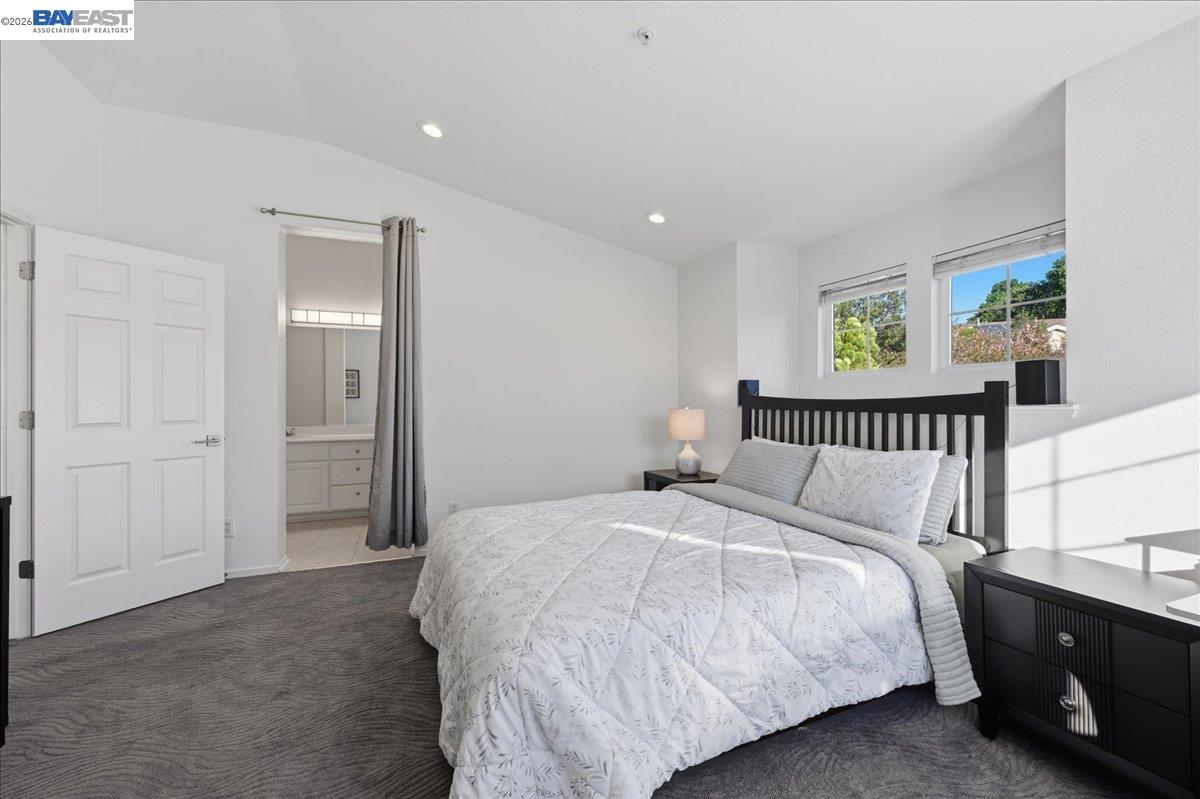 130 Sutter Creek Lane San Ramon, CA 94583 - Photo 33 of 56 a bedroom with a bed and painting on the wall