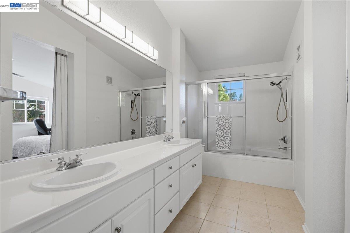 130 Sutter Creek Lane San Ramon, CA 94583 - Photo 39 of 56 a spacious bathroom with a shower sink and mirror