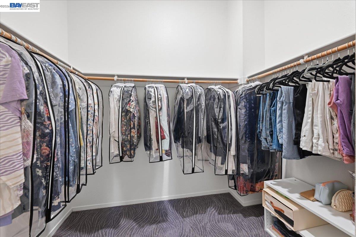 130 Sutter Creek Lane San Ramon, CA 94583 - Photo 46 of 56 a view of walk in closet with clothes and shoes