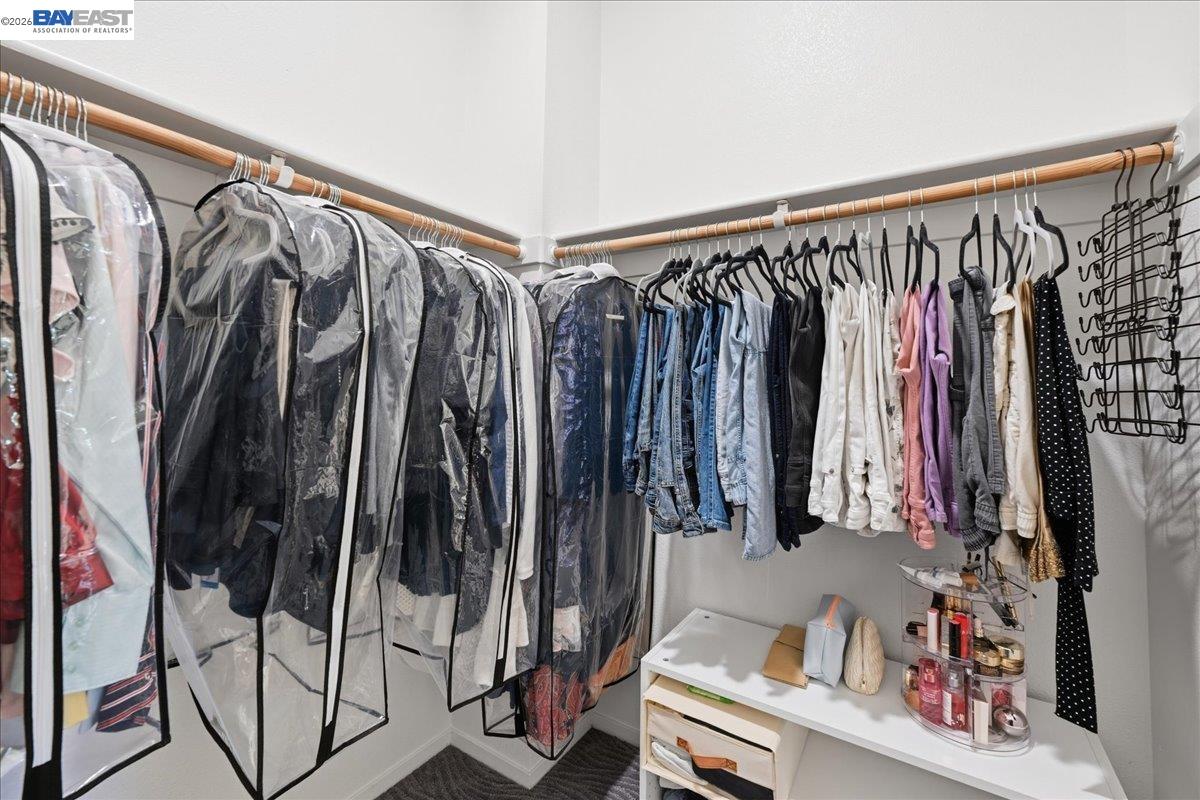 130 Sutter Creek Lane San Ramon, CA 94583 - Photo 47 of 56 a view of walk in closet with clothes and shoes