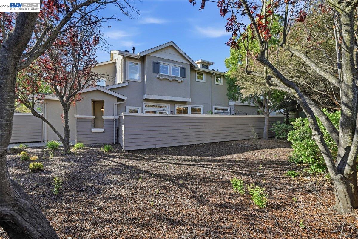 130 Sutter Creek Lane San Ramon, CA 94583 - Photo 5 of 56 a view of a house with a yard and large tree