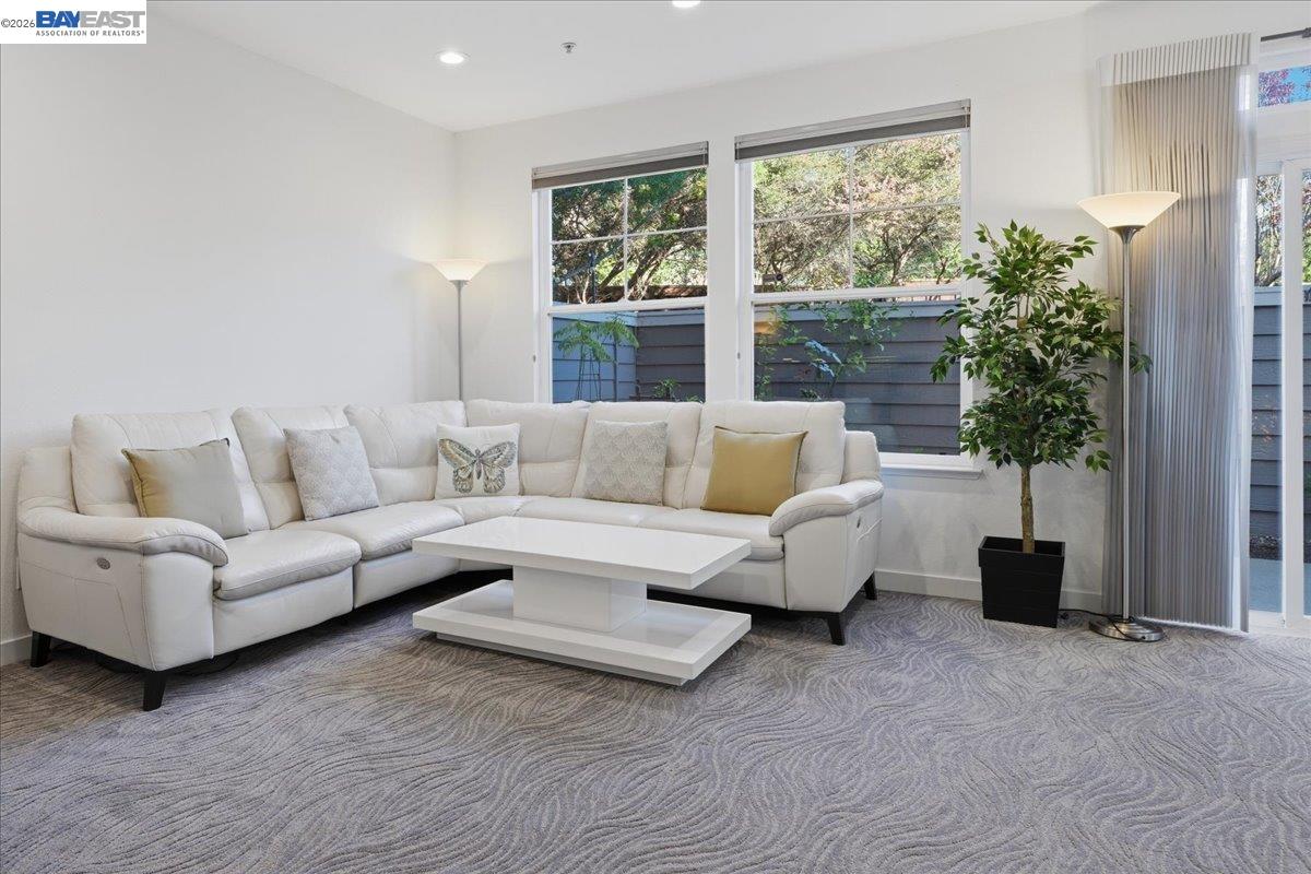 130 Sutter Creek Lane San Ramon, CA 94583 - Photo 10 of 56 a living room with furniture and a large window