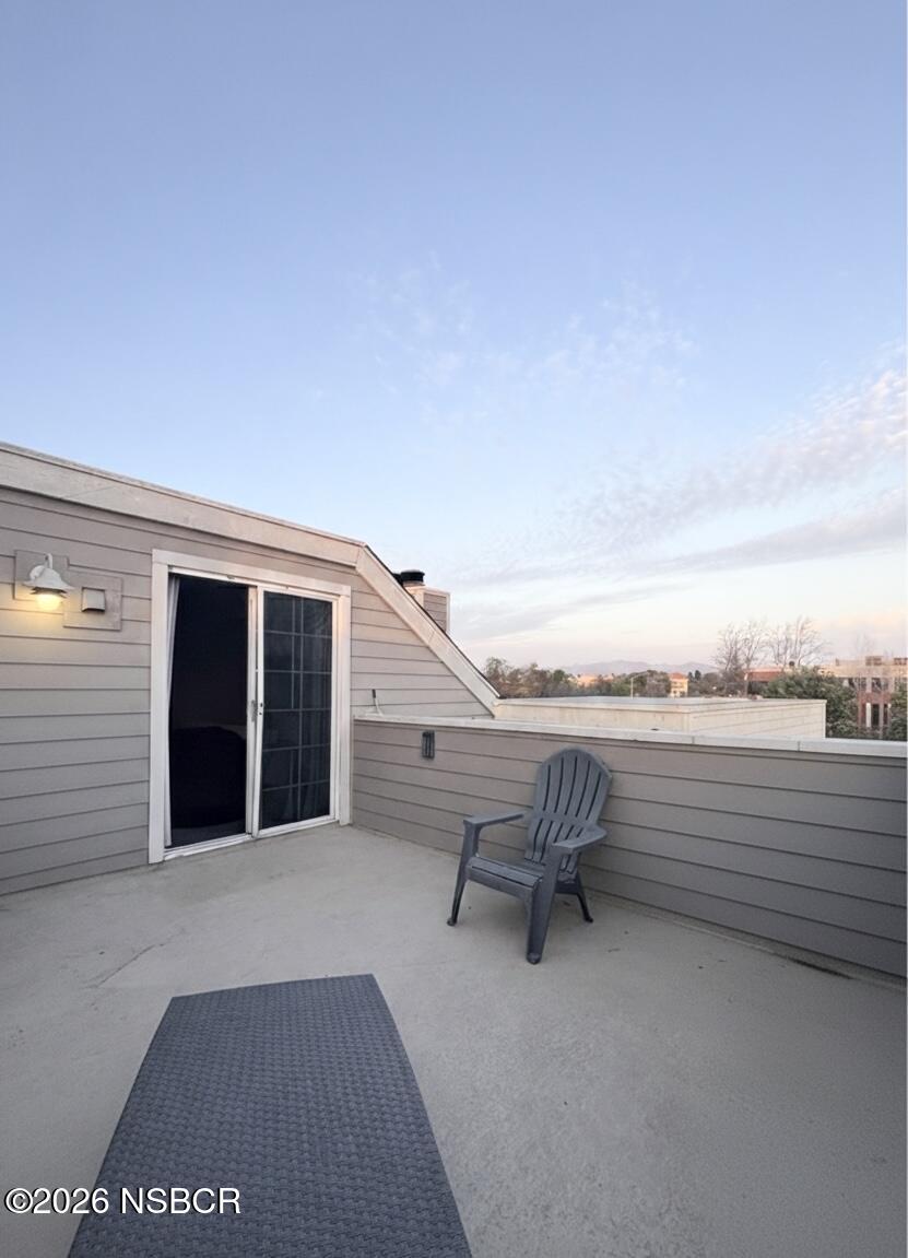 2409 Country Lane Santa Maria, CA 93455 - Photo 11 of 20 a view of roof deck with couches and sky view
