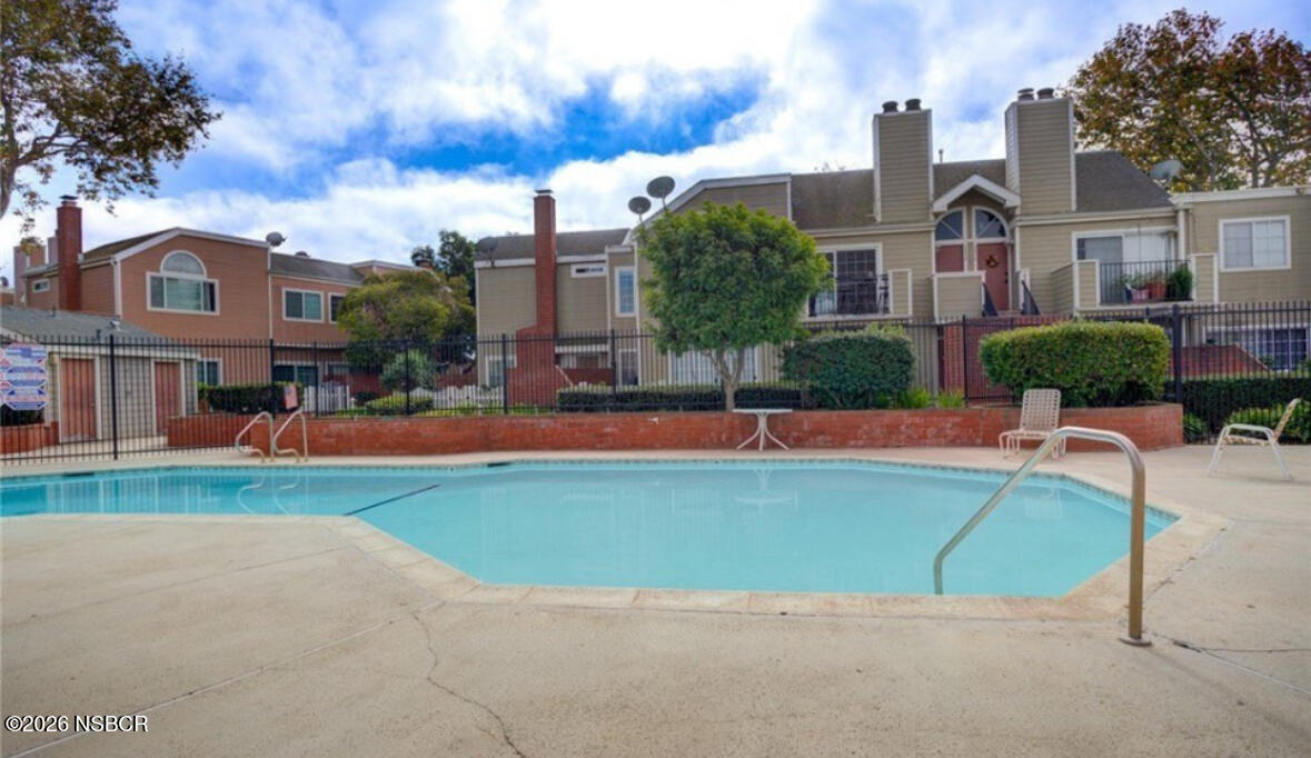 2409 Country Lane Santa Maria, CA 93455 - Photo 14 of 20 a view of a building with a swimming pool