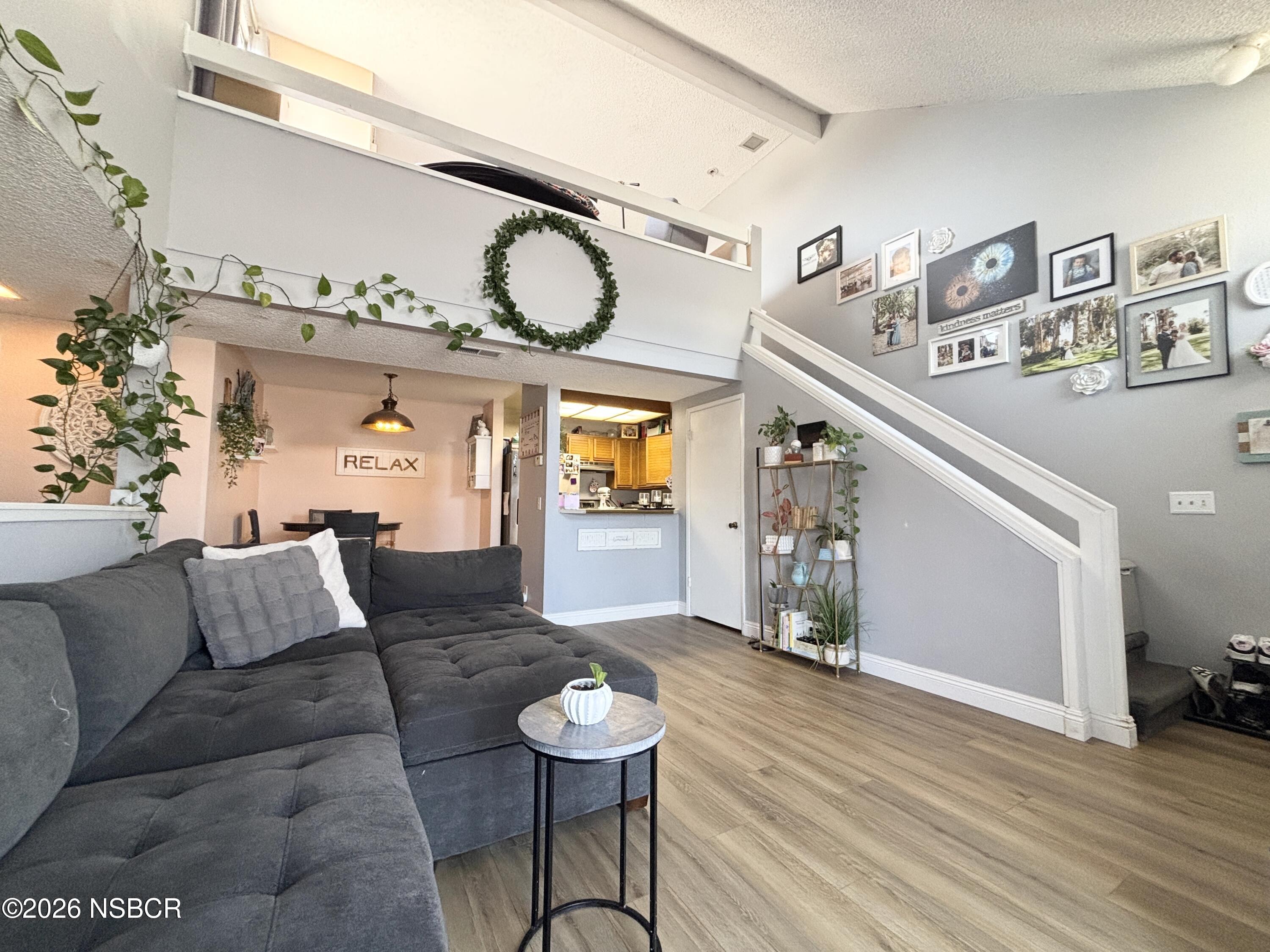 2409 Country Lane Santa Maria, CA 93455 - Photo 17 of 20 a living room with furniture and wooden floor