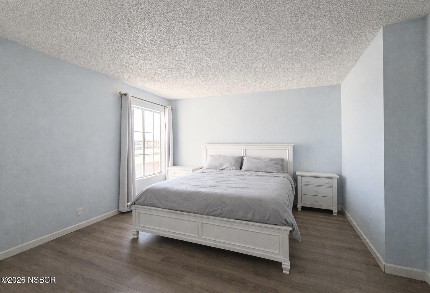 2409 Country Lane Santa Maria, CA 93455 - Photo 2 of 20 a bedroom with a bed and a window