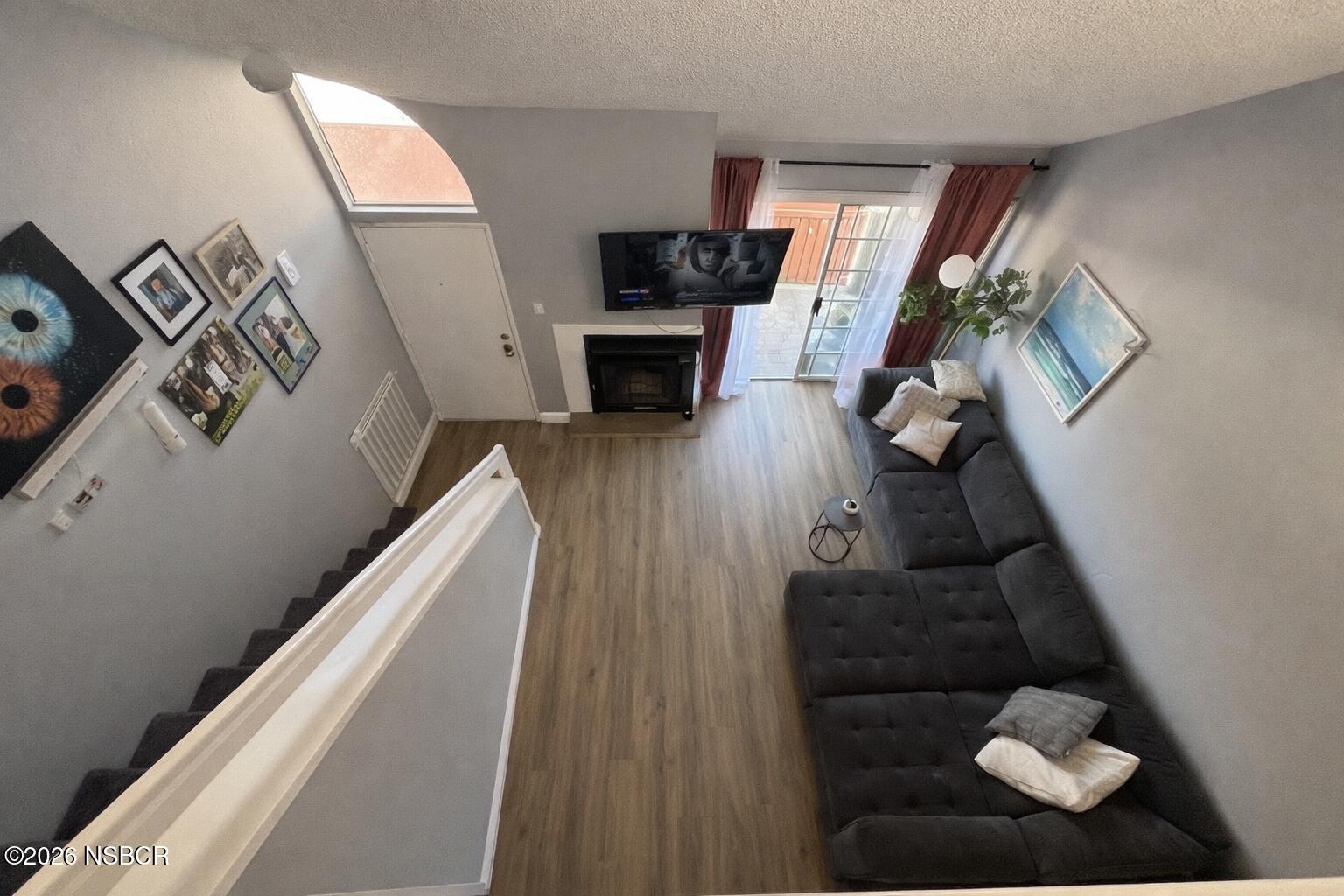 2409 Country Lane Santa Maria, CA 93455 - Photo 7 of 20 a living room with furniture and a fireplace