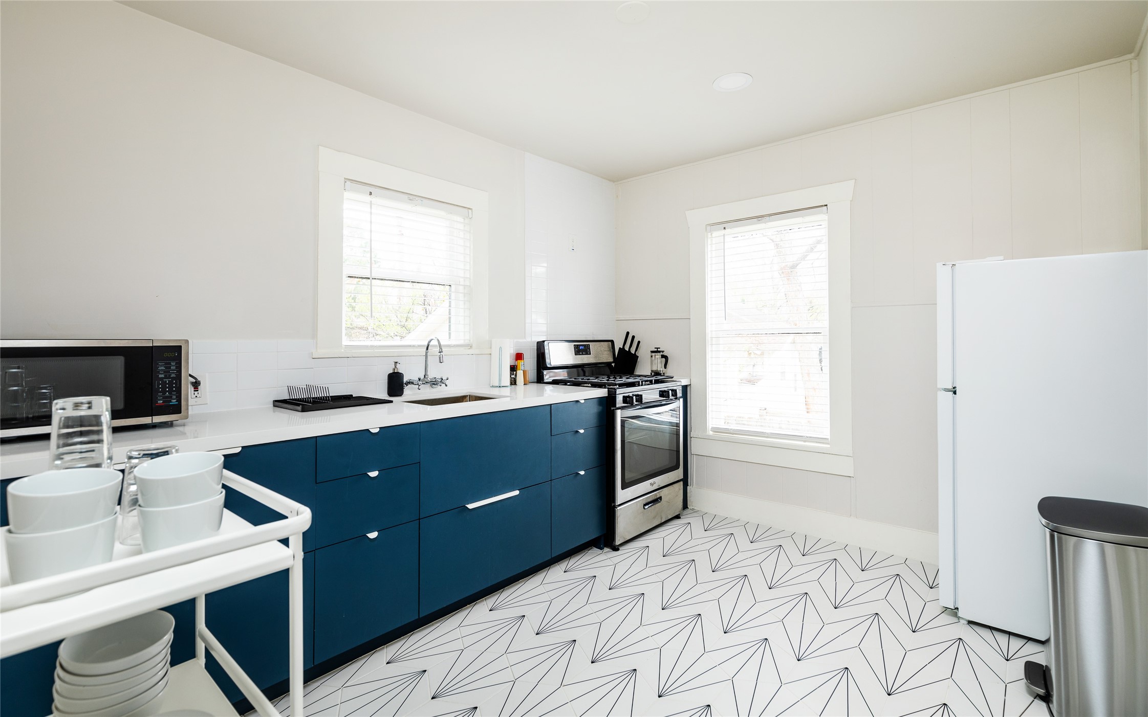 114 Redan Street, Unit 3 Houston, TX 77009 - Photo 8 of 15 Beautifully designed with contemporary finishes throughout. New exhaust fan over oven installed but not pictured here.
