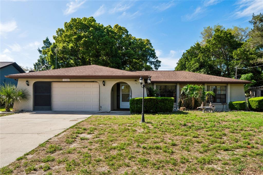 front view of a house with a yard
