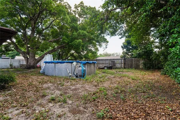 a view of backyard with green space