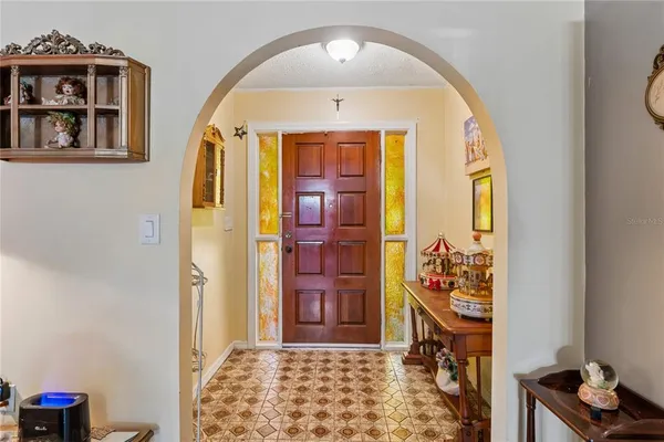 a view of a entryway door of the room