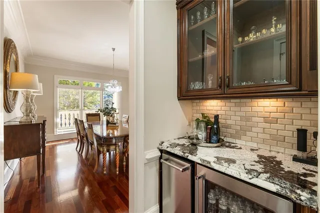 a kitchen with granite countertop a stove and a sink