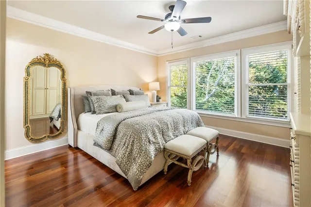 an aerial view of a house with a yard and garden