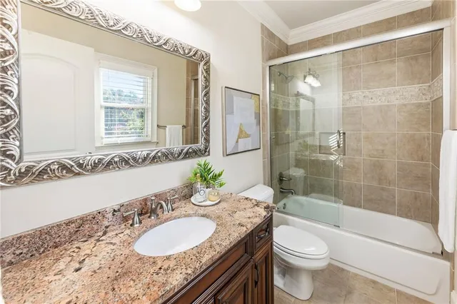 a front view of a building with outdoor seating