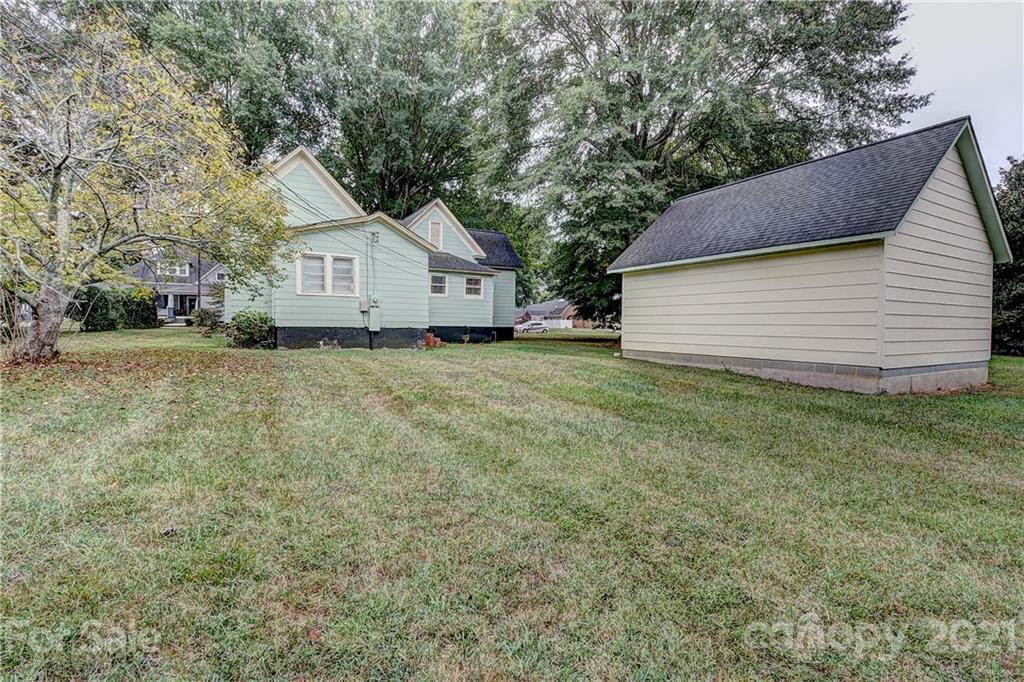 202 West Main Street Cherryville, NC 28021 - Photo 5 of 17 a view of a house with a yard