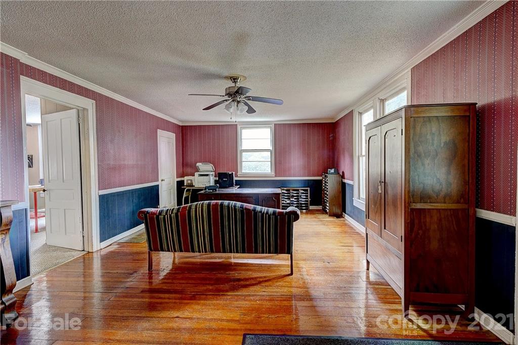 202 West Main Street Cherryville, NC 28021 - Photo 6 of 17 a living room with furniture fireplace and a window