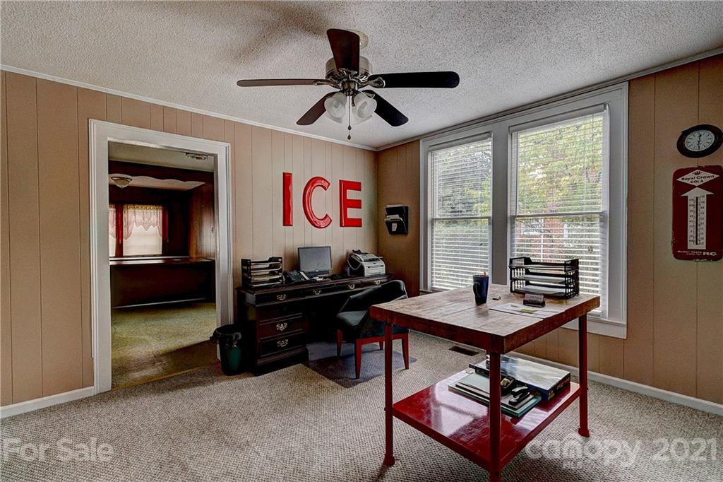 202 West Main Street Cherryville, NC 28021 - Photo 8 of 17 a view of a workspace with furniture and a window