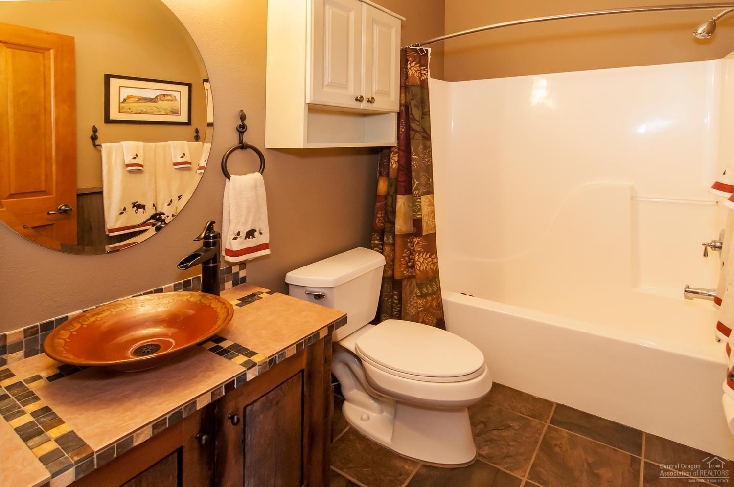 61428 Elder Ridge Street Bend, OR 97702 - Photo 13 of 25 Full bath downstairs with raised counter