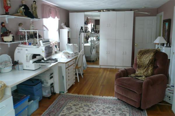 23 Whittier Road Billerica, MA 01821 - Photo 16 of 25 a living room with furniture and a wooden floor