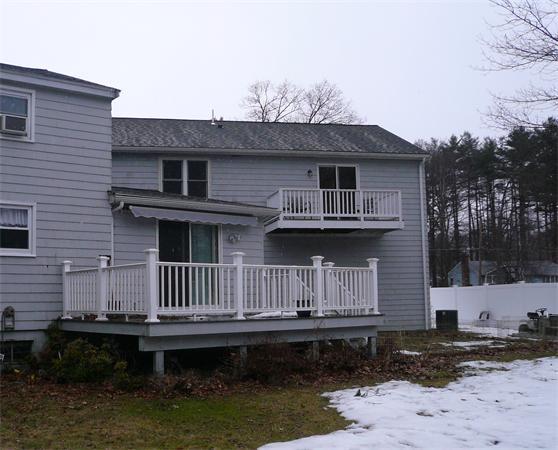 23 Whittier Road Billerica, MA 01821 - Photo 25 of 25 a front view of a house with balcony