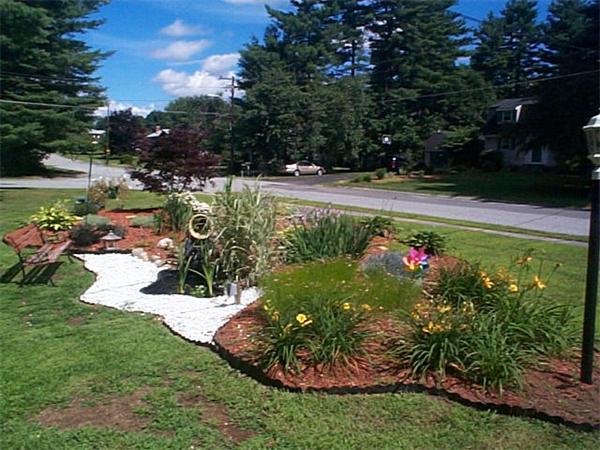 23 Whittier Road Billerica, MA 01821 - Photo 3 of 25 a view of a garden with sitting area