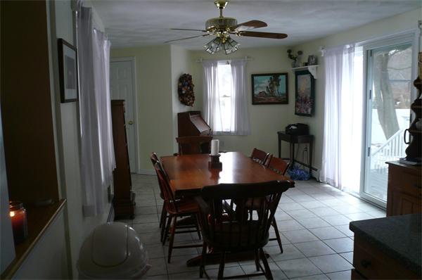 23 Whittier Road Billerica, MA 01821 - Photo 5 of 25 a view of a dining room with furniture and wooden floor