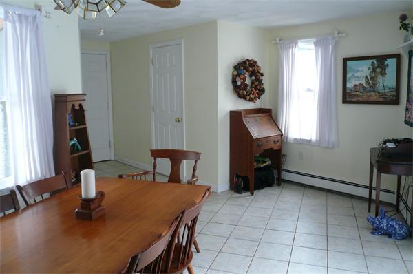 23 Whittier Road Billerica, MA 01821 - Photo 6 of 25 a room with furniture and a window