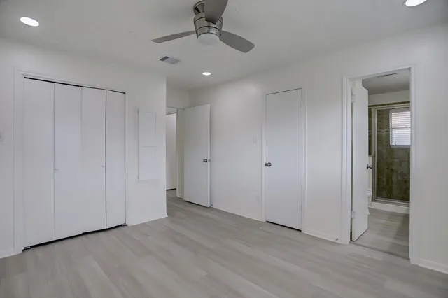 a view of a livingroom with wooden floor