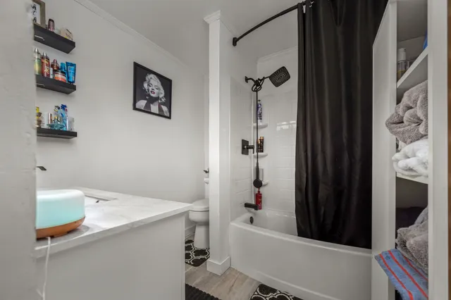 a bathroom with a sink double vanity and a mirror