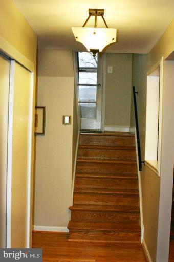 3812 Kelsey Street Silver Spring, MD 20906 - Photo 12 of 19 Formal Foyer with new lighting and hardwood floor