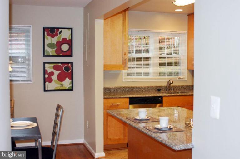 3812 Kelsey Street Silver Spring, MD 20906 - Photo 4 of 19 NEW Granite counter top and recessed lighting!