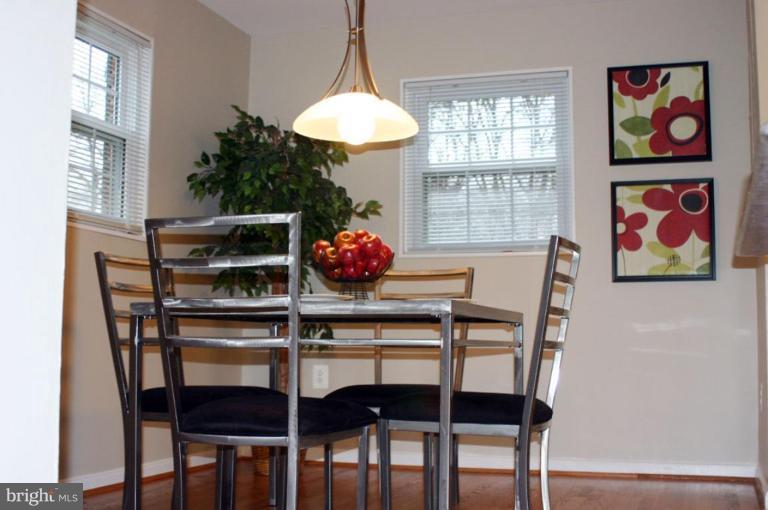 3812 Kelsey Street Silver Spring, MD 20906 - Photo 5 of 19 Eat-in kitchen has new wood and ceramic floors