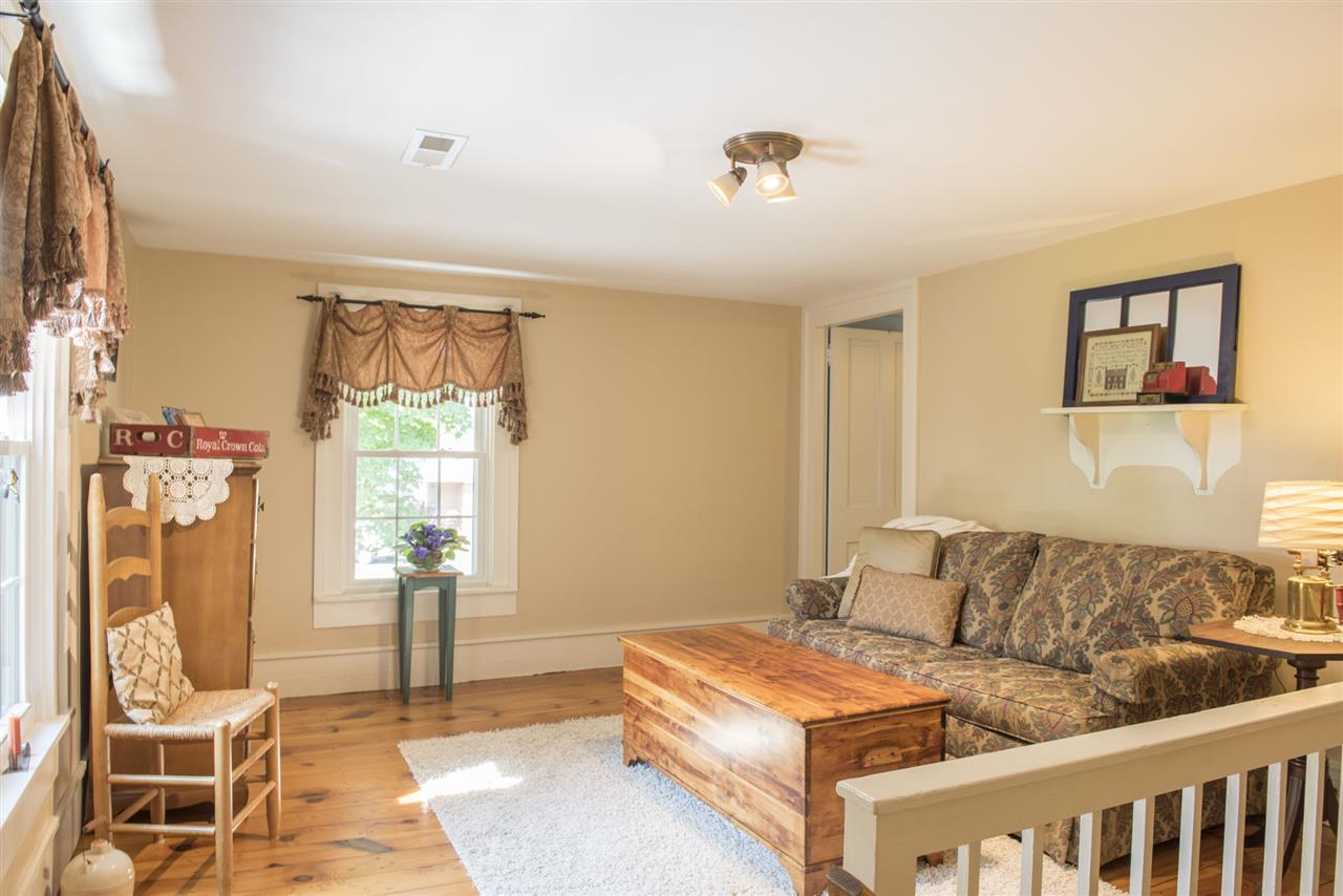 2191 West Dry River Road Dayton, VA 22821 - Photo 31 of 50 a living room with a couch and a table