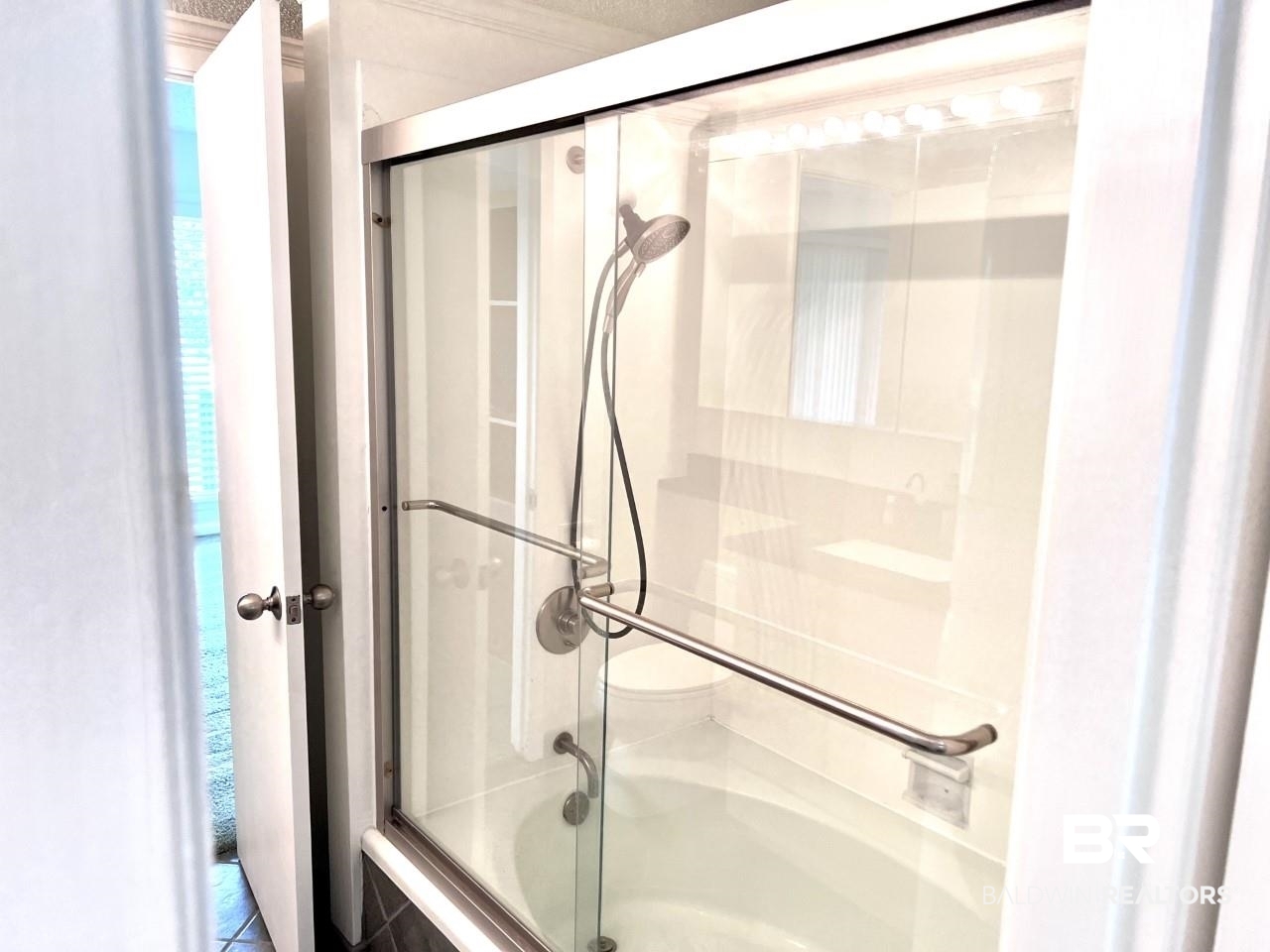 208 Golf Terrace, Unit 208 Daphne, AL 36526 - Photo 18 of 22 Glass doors installed aro