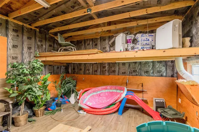 a front view of a house with a swimming pool