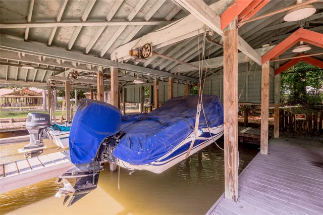 a view of a chairs in wooden deck