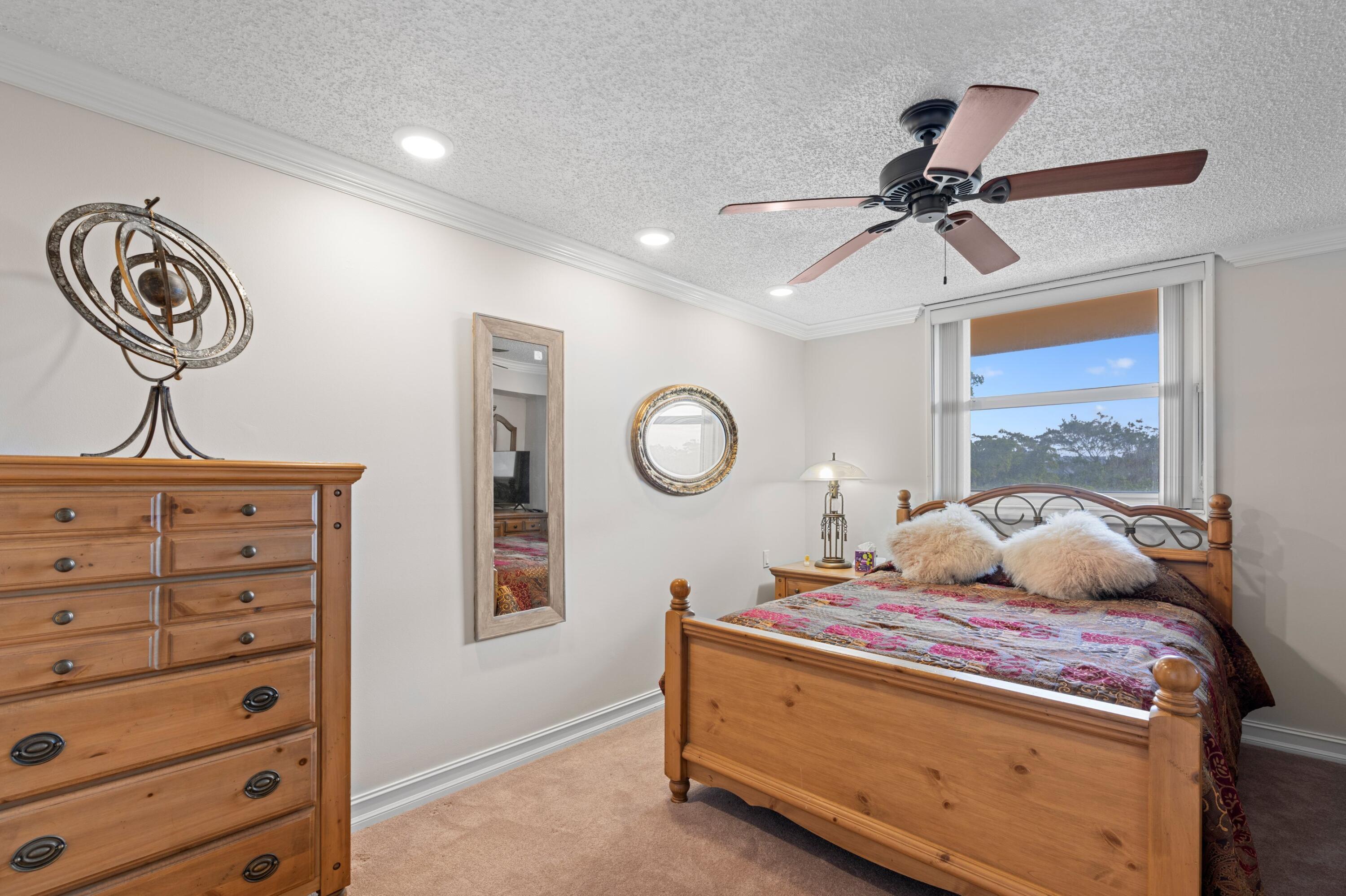6461 Northwest 2nd Avenue, Unit 415 Boca Raton, FL 33487 - Photo 13 of 25 Guest Bedroom