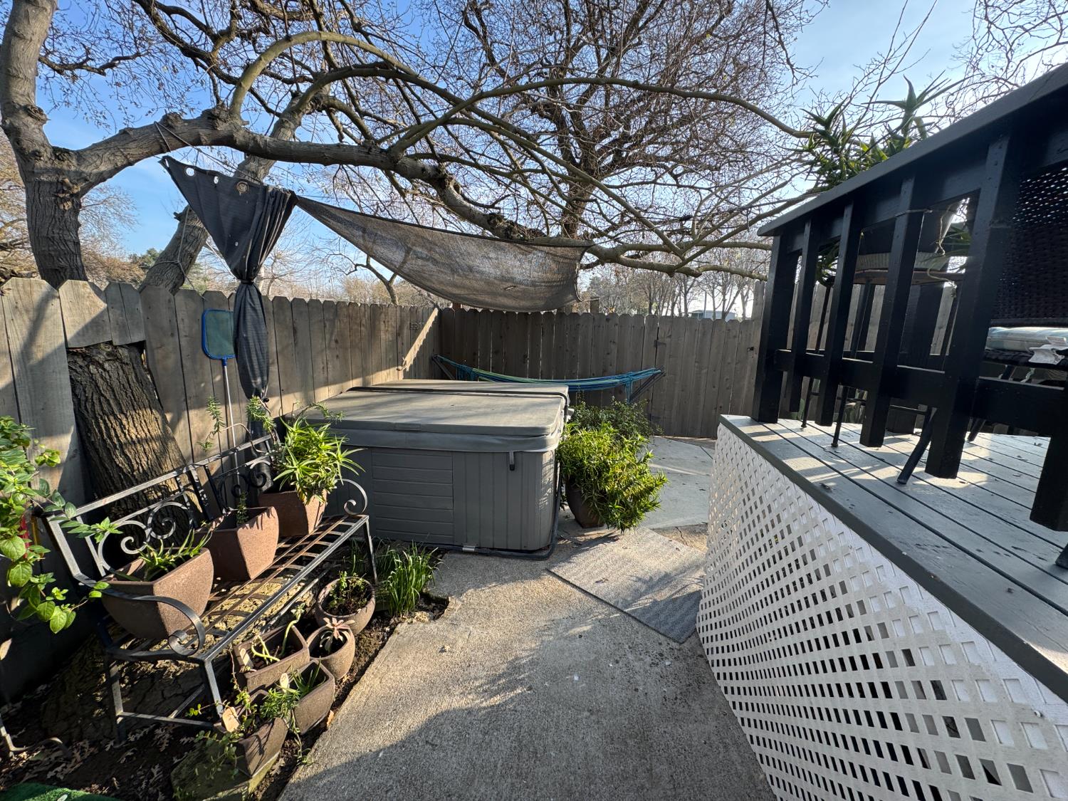 1777 Circle Drive Isleton, CA 95641 - Photo 14 of 20 a view of a patio with couches table and chairs and potted plants