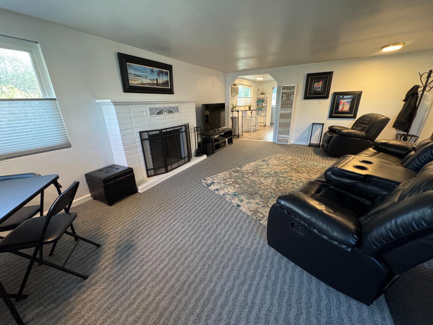 1777 Circle Drive Isleton, CA 95641 - Photo 2 of 20 a living room with furniture and a fireplace