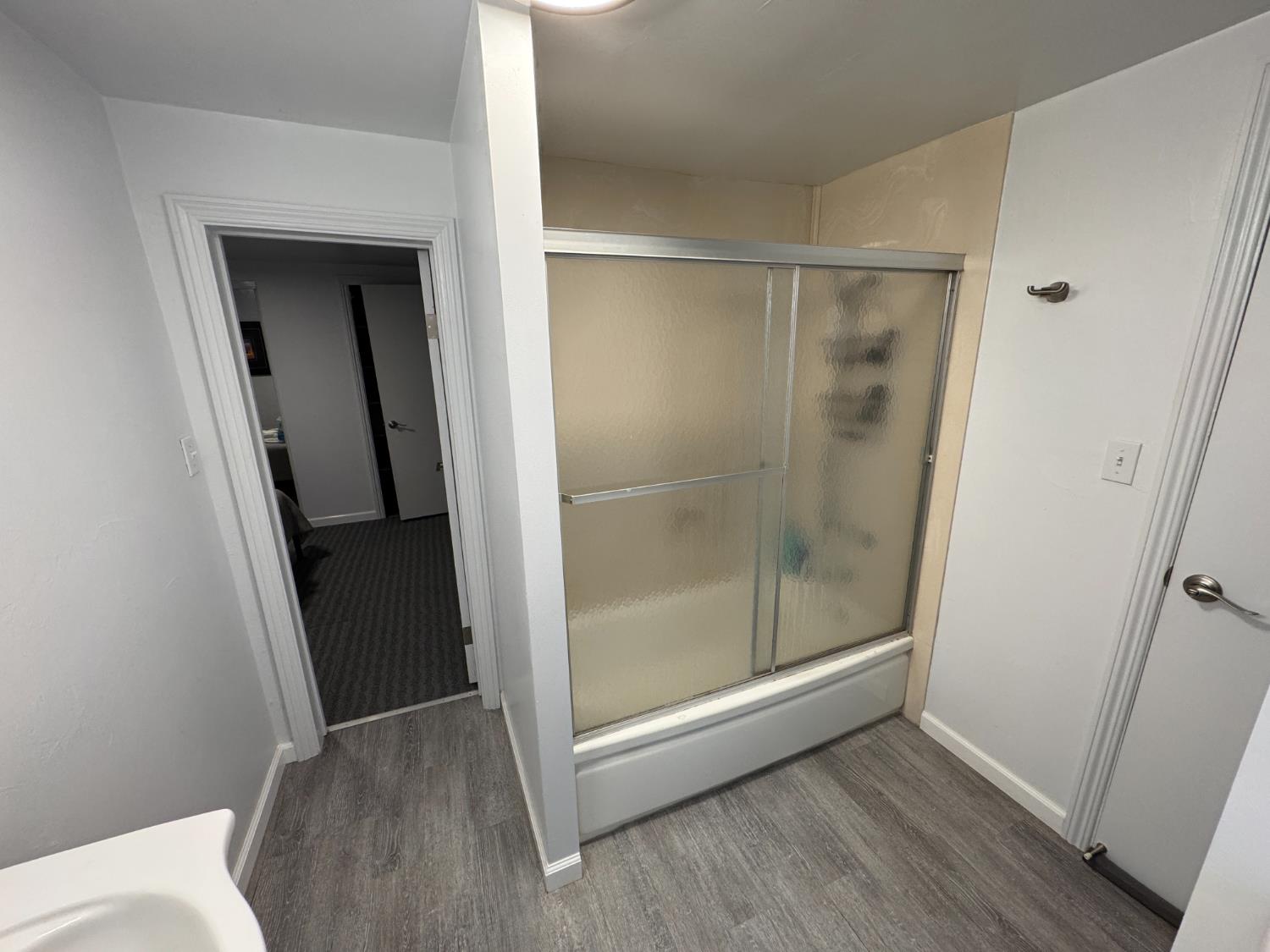 1777 Circle Drive Isleton, CA 95641 - Photo 7 of 20 a bathroom with a glass door shower