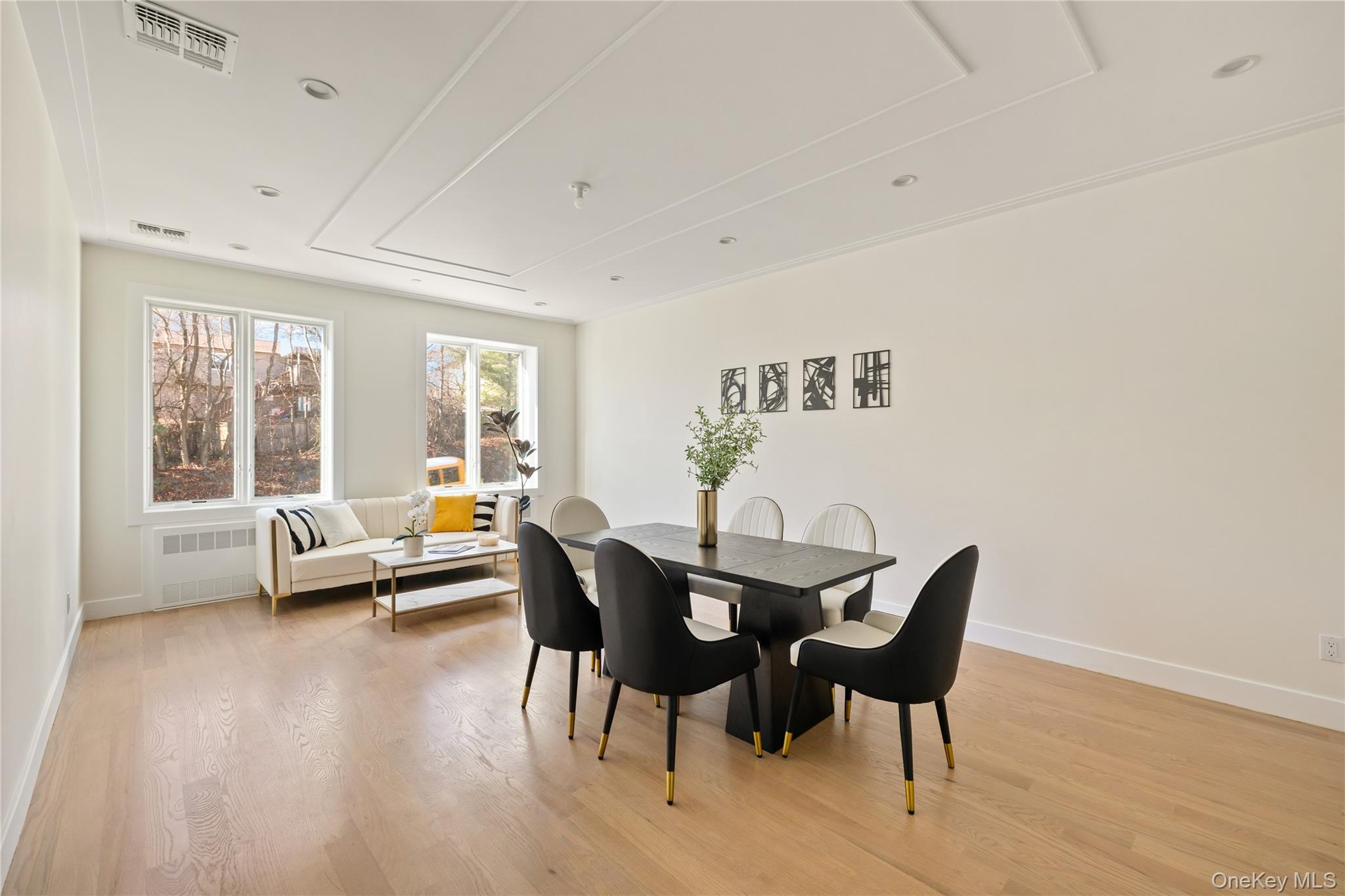 3 Valley Way, Unit 321 Spring Valley, NY 10977 - Photo 14 of 41 Dining space featuring light wood finished floors, radiator heating unit, and recessed lighting