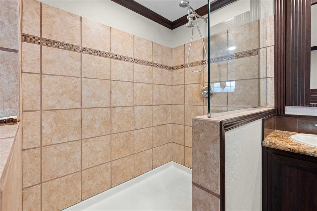 3283 Neff Lake Road Brooksville, FL 34602 - Photo 23 of 37 a bathroom with a shower