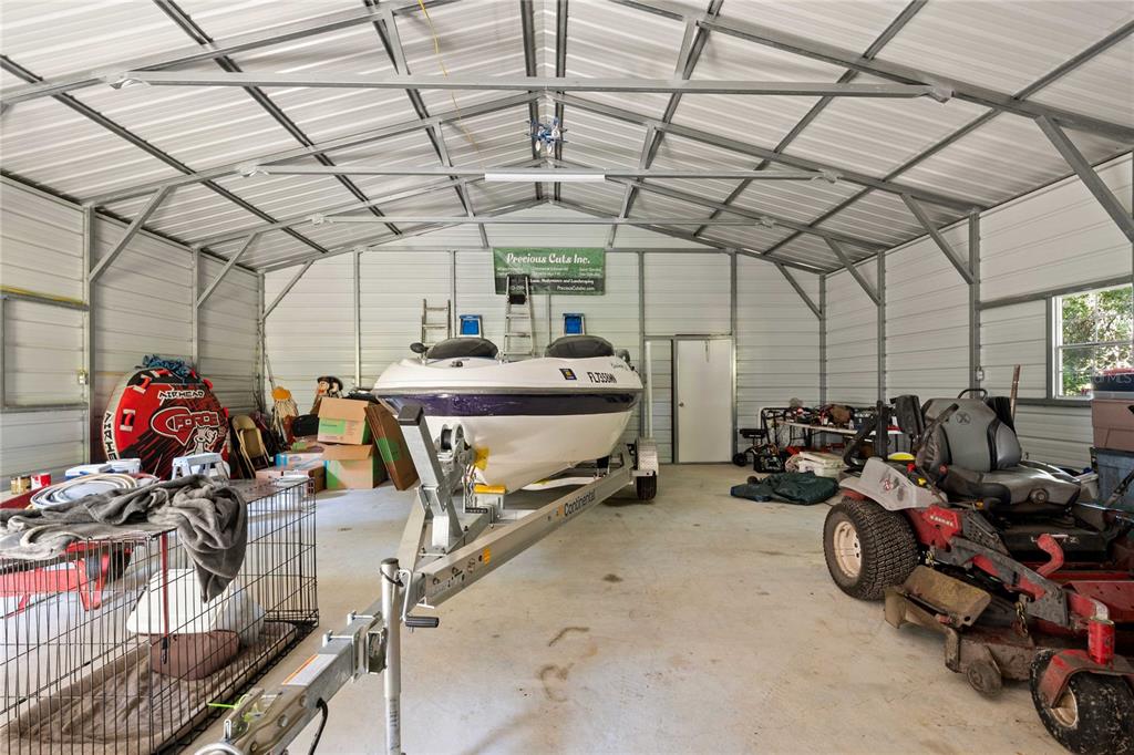 3283 Neff Lake Road Brooksville, FL 34602 - Photo 29 of 37 a view of a room with gym equipment