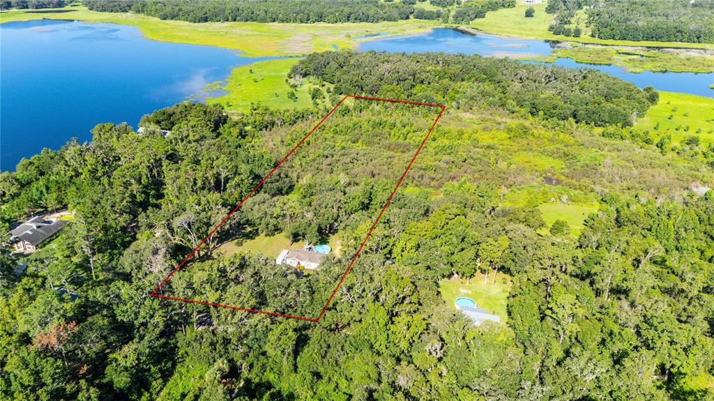 3283 Neff Lake Road Brooksville, FL 34602 - Photo 8 of 37 a view of a lake and green space