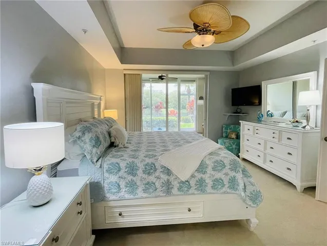 a bedroom with a bed and a cabinets