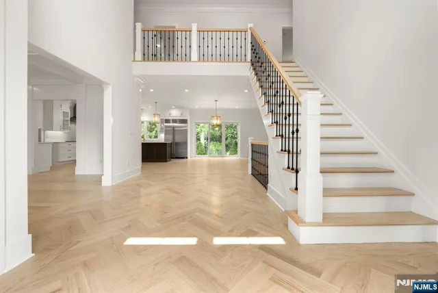 a view of a hallway with staircase
