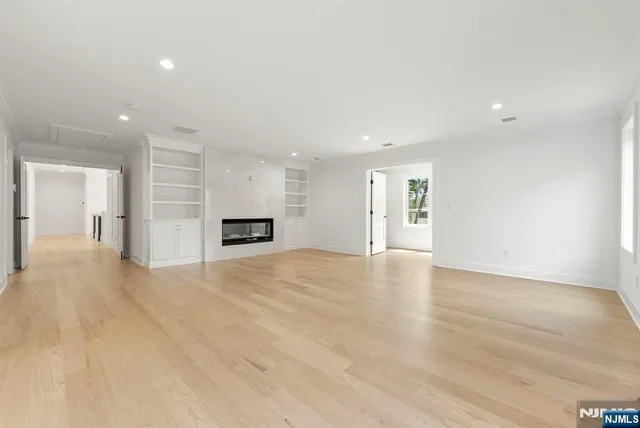 a view of an empty room with stairs